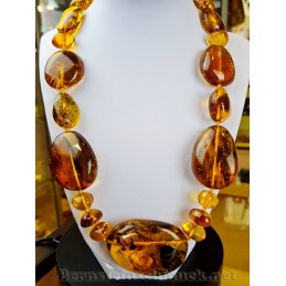 Amber necklace with multiple inclusions: spiders termite mosquito moss plants